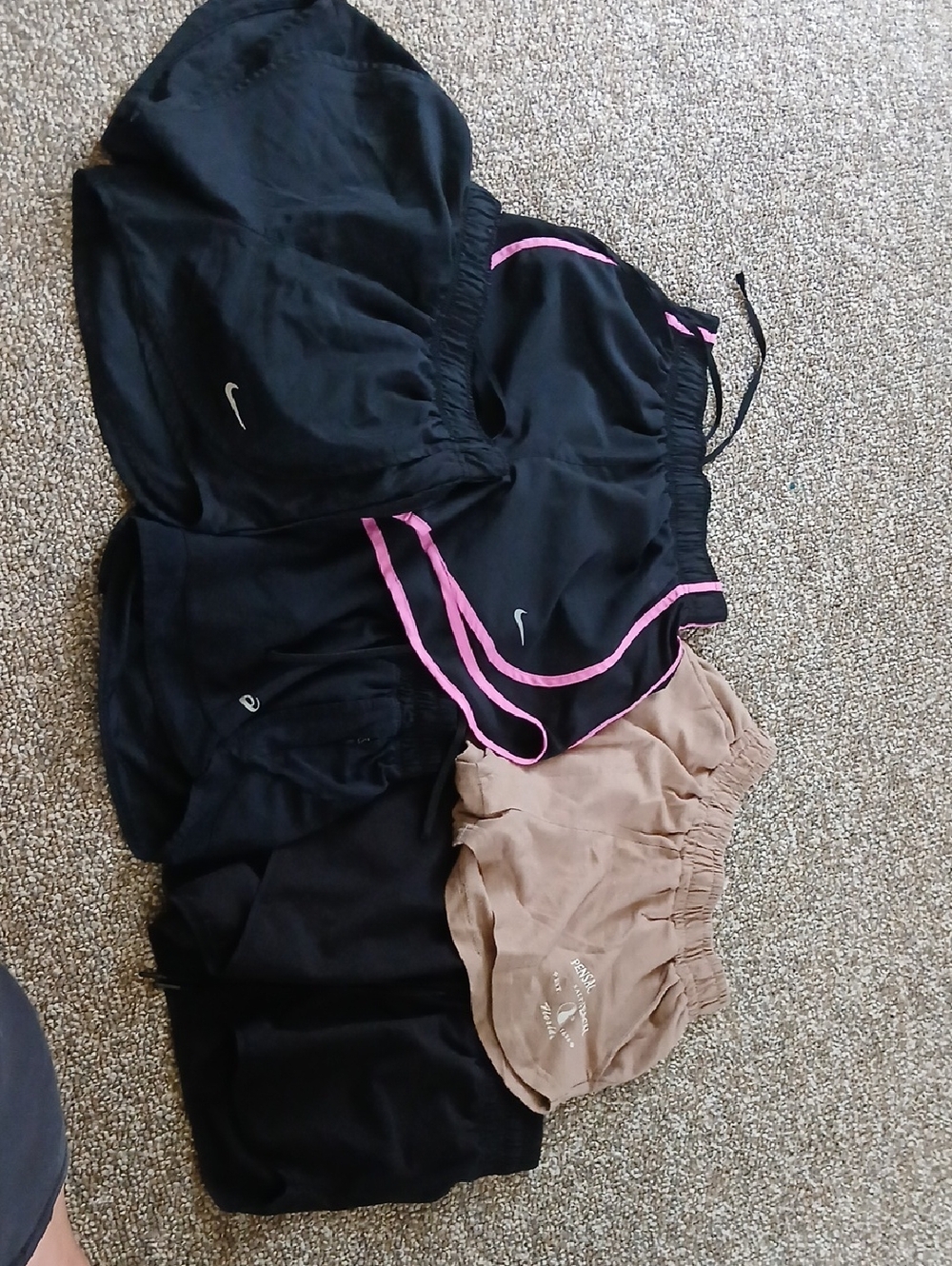 Nike Black Athletic Shorts with Pink Trim and Tan Pair